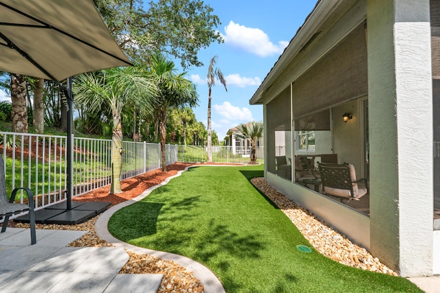 876 SW Rocky Bayou Ter, Port Saint Lucie, FL 34986 - fenced backyard with a sunroom