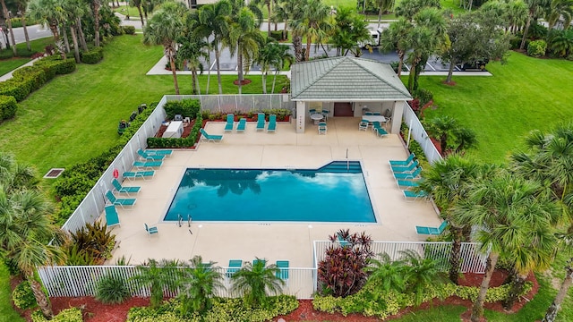 876 SW Rocky Bayou Ter, Port Saint Lucie, FL 34986 - community pool featuring a fenced backyard, a patio, and a gazebo