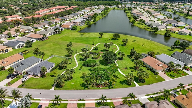 876 SW Rocky Bayou Ter, Port Saint Lucie, FL 34986 - aerial perspective of suburban area with a large body of water