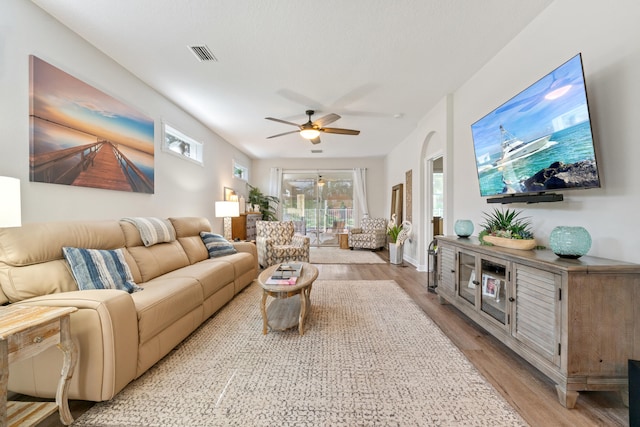 876 SW Rocky Bayou Ter, Port Saint Lucie, FL 34986 - living area featuring light wood-style floors and ceiling fan