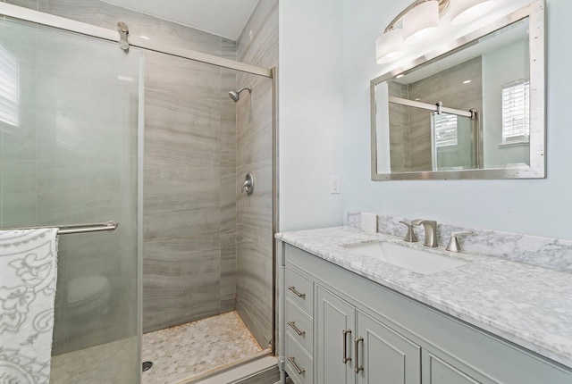 1157 NW 14th Ter, Stuart, FL 34994 - bathroom with vanity and a stall shower