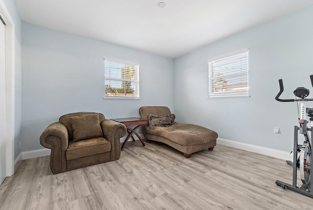 1157 NW 14th Ter, Stuart, FL 34994 - living area featuring light wood-type flooring and baseboards