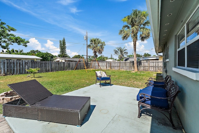 1157 NW 14th Ter, Stuart, FL 34994 - fenced backyard featuring a patio area and a playground