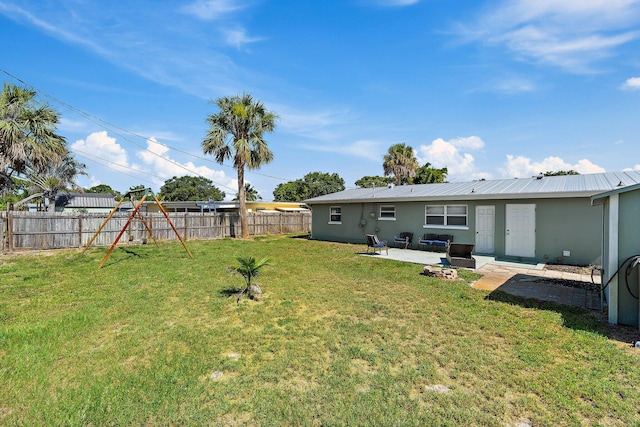 1157 NW 14th Ter, Stuart, FL 34994 - fenced backyard with a patio