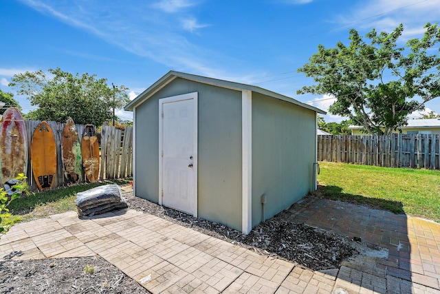 1157 NW 14th Ter, Stuart, FL 34994 - view of shed with a fenced backyard