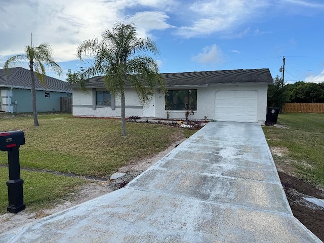 327 NE Surfside Ave, Port Saint Lucie, FL 34983 - single story home with an attached garage, concrete driveway, and stucco siding