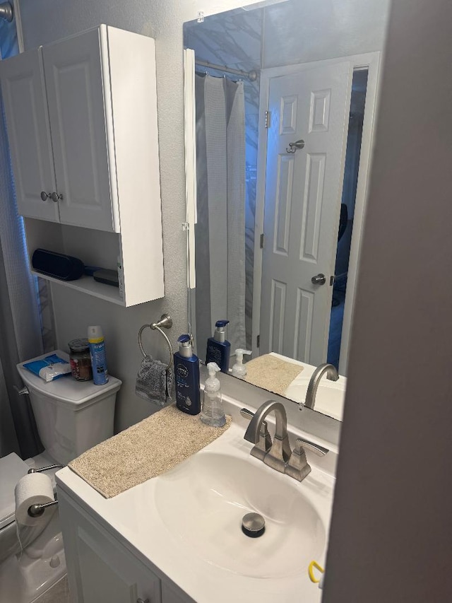 327 NE Surfside Ave, Port Saint Lucie, FL 34983 - full bathroom featuring vanity and curtained shower