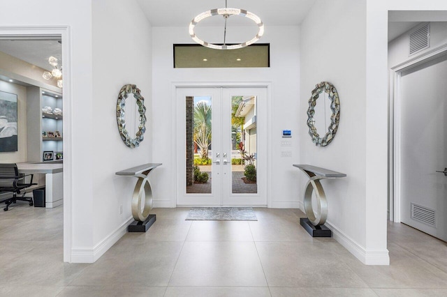 17432 Ponte Chiasso Dr, Boca Raton, FL 33496 - tiled foyer featuring french doors and baseboards