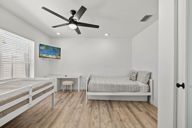 346 Hernando St, Hutchinson Island, FL 34949 - bedroom with light wood-type flooring, recessed lighting, and ceiling fan