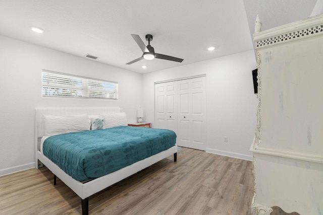 346 Hernando St, Hutchinson Island, FL 34949 - bedroom with light wood-style flooring, a closet, recessed lighting, and a ceiling fan