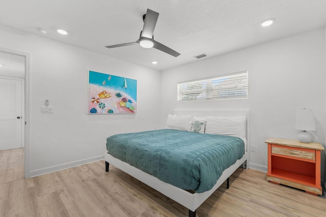 346 Hernando St, Hutchinson Island, FL 34949 - bedroom featuring light wood-style floors, a ceiling fan, and recessed lighting