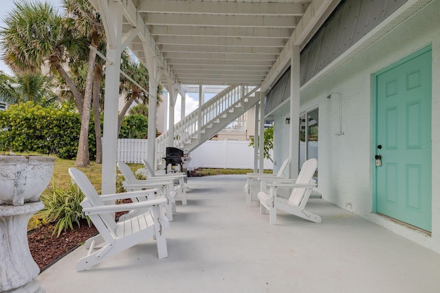 346 Hernando St, Hutchinson Island, FL 34949 - view of patio with stairway and area for grilling
