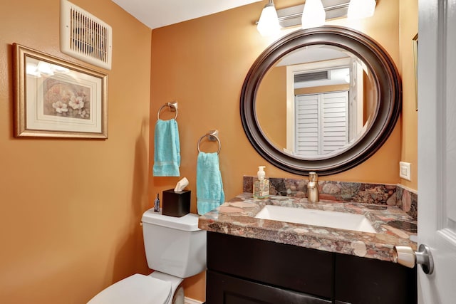 237 Farnham J, Deerfield Beach, FL 33442 - half bathroom featuring vanity and toilet