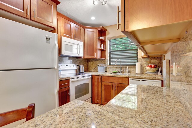 237 Farnham J, Deerfield Beach, FL 33442 - kitchen featuring white appliances, open shelves, tasteful backsplash, light stone countertops, and recessed lighting