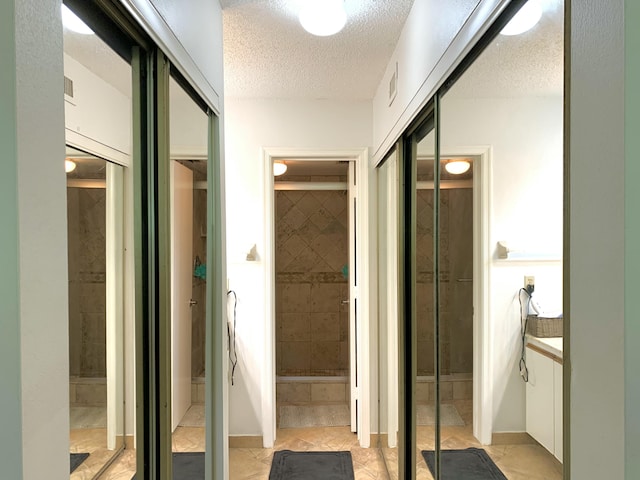 101 Liberty Ct, Deerfield Beach, FL 33442 - bathroom featuring a textured ceiling