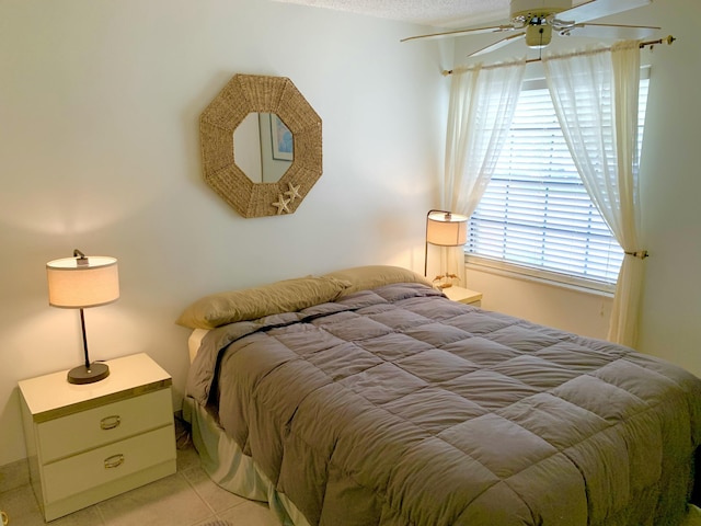 101 Liberty Ct, Deerfield Beach, FL 33442 - bedroom with a ceiling fan and light tile patterned flooring