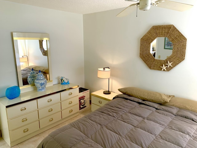 101 Liberty Ct, Deerfield Beach, FL 33442 - bedroom with ceiling fan, light tile patterned floors, and a textured ceiling