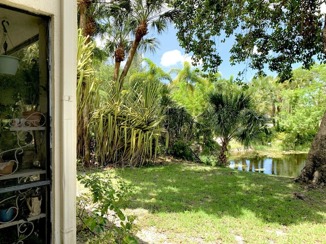 101 Liberty Ct, Deerfield Beach, FL 33442 - view of grassy yard featuring a water view