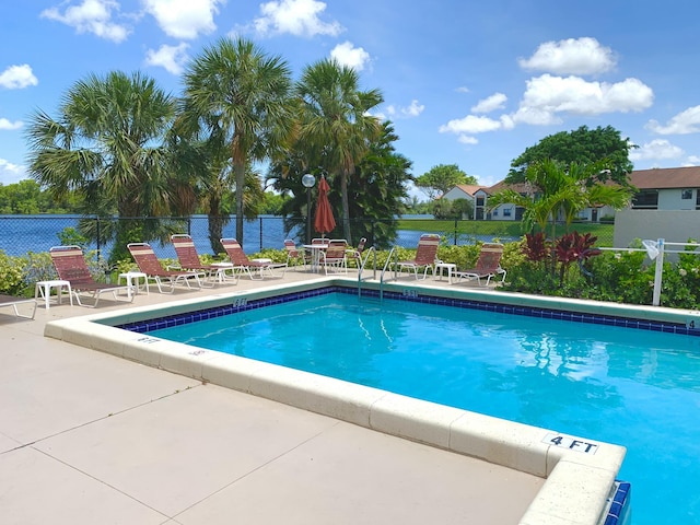 101 Liberty Ct, Deerfield Beach, FL 33442 - community pool featuring a patio area