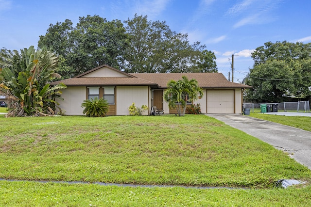 1882 SW Agnes St, Port Saint Lucie, FL 34953 - single story home with an attached garage and driveway