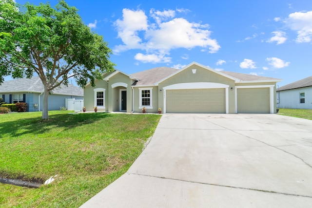 4589 SW Van Dyke St, Port Saint Lucie, FL 34953 - ranch-style house with driveway, an attached garage, a front lawn, and stucco siding