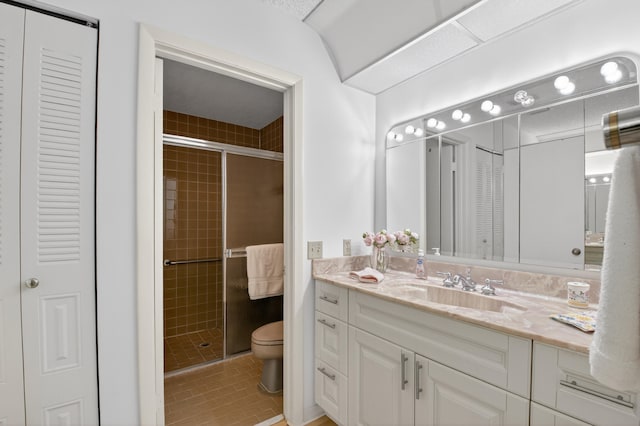 2915 NW 14th St, Delray Beach, FL 33445 - full bath featuring a closet, vanity, a stall shower, and tile patterned flooring