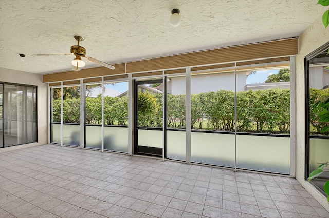 2915 NW 14th St, Delray Beach, FL 33445 - unfurnished sunroom featuring ceiling fan and healthy amount of natural light