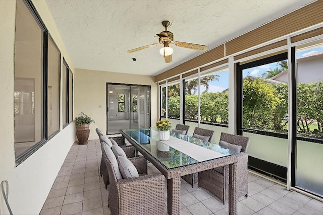 2915 NW 14th St, Delray Beach, FL 33445 - sunroom / solarium featuring healthy amount of natural light, ceiling fan, and outdoor dining space