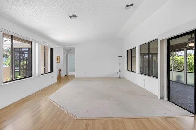 2915 NW 14th St, Delray Beach, FL 33445 - unfurnished room featuring wood finished floors and a textured ceiling
