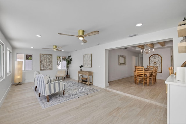 131 Cruiser Rd S, North Palm Beach, FL 33408 - living area featuring recessed lighting, light wood finished floors, a chandelier, and a ceiling fan