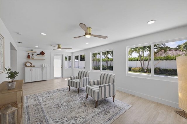 131 Cruiser Rd S, North Palm Beach, FL 33408 - living area with light wood-style flooring, ceiling fan, and recessed lighting