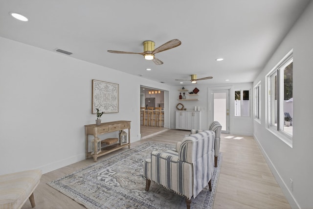 131 Cruiser Rd S, North Palm Beach, FL 33408 - living area with a ceiling fan, light wood finished floors, and recessed lighting