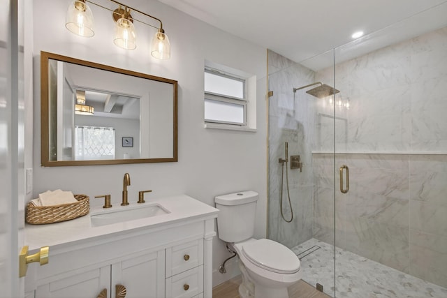 131 Cruiser Rd S, North Palm Beach, FL 33408 - bathroom featuring healthy amount of natural light, a shower stall, and vanity