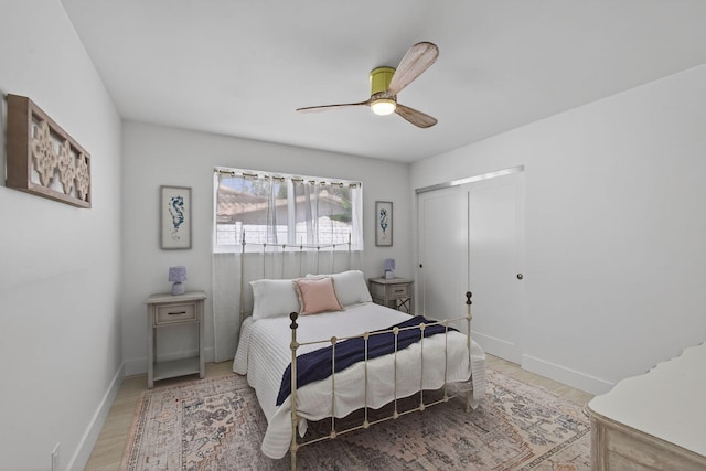 131 Cruiser Rd S, North Palm Beach, FL 33408 - bedroom featuring light wood finished floors, a closet, and a ceiling fan