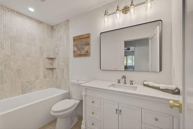131 Cruiser Rd S, North Palm Beach, FL 33408 - bathroom featuring vanity, wood finished floors, and shower / bath combination