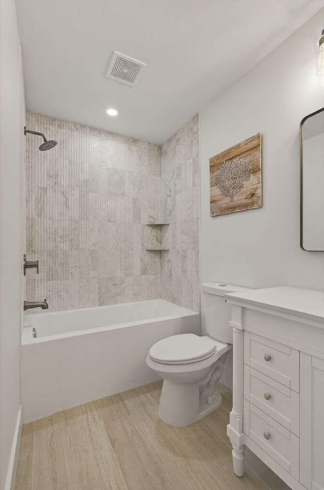 131 Cruiser Rd S, North Palm Beach, FL 33408 - full bathroom with vanity, tub / shower combination, and wood finished floors