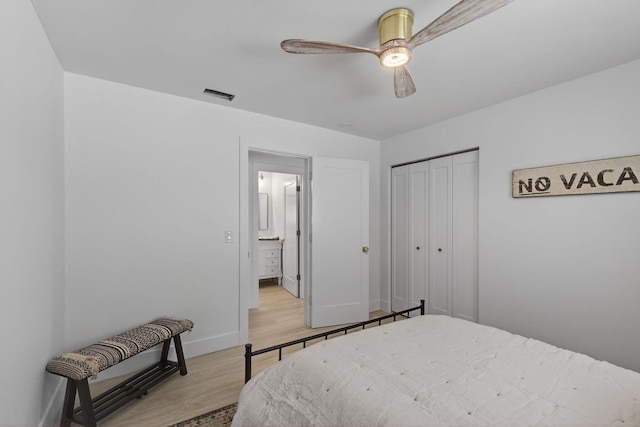 131 Cruiser Rd S, North Palm Beach, FL 33408 - bedroom with light wood-style floors, a closet, and ceiling fan