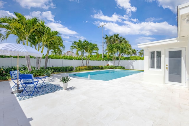 131 Cruiser Rd S, North Palm Beach, FL 33408 - view of pool with a patio area and a fenced backyard