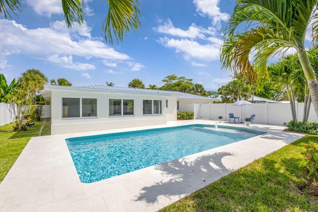 131 Cruiser Rd S, North Palm Beach, FL 33408 - view of swimming pool featuring a patio and a fenced backyard
