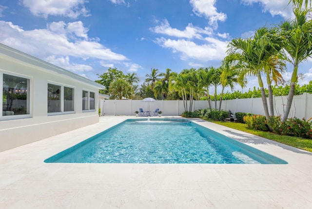 131 Cruiser Rd S, North Palm Beach, FL 33408 - view of swimming pool featuring a patio area and a fenced backyard