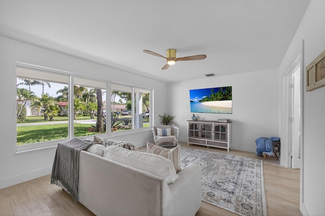 131 Cruiser Rd S, North Palm Beach, FL 33408 - living area featuring a ceiling fan and light wood-type flooring