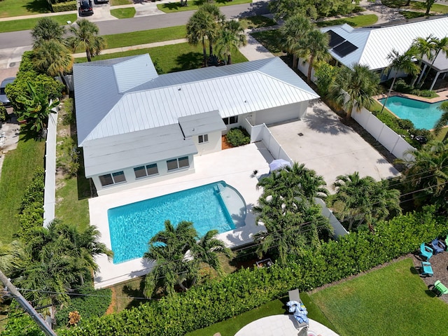 131 Cruiser Rd S, North Palm Beach, FL 33408 - view of subject property featuring a pool area
