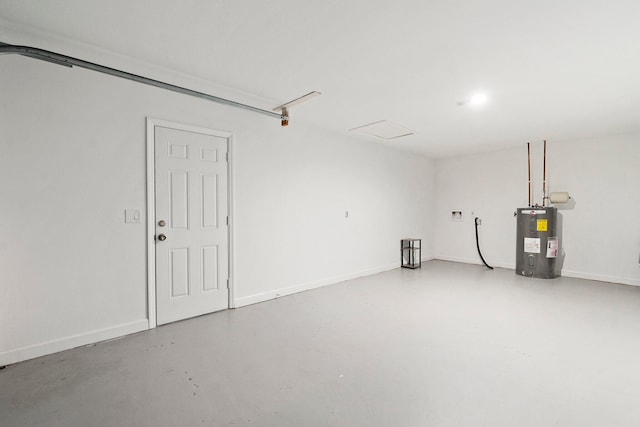 1251 SW Sudder Ave, Port Saint Lucie, FL 34953 - garage featuring electric water heater and baseboards