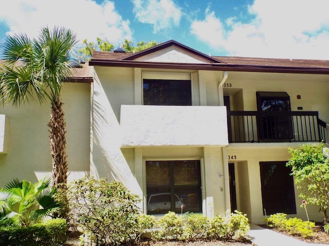 3350 Perimeter Dr Unit 1323, Greenacres, FL 33467 - view of front facade with a balcony and stucco siding