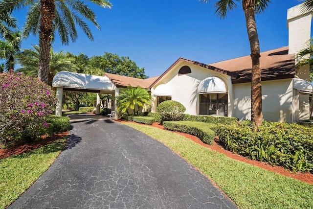 3350 Perimeter Dr Unit 1323, Greenacres, FL 33467 - mediterranean / spanish home with stucco siding and driveway