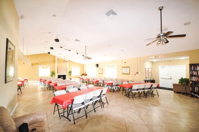3350 Perimeter Dr Unit 1323, Greenacres, FL 33467 - dining area featuring lofted ceiling, a ceiling fan, and light tile patterned floors