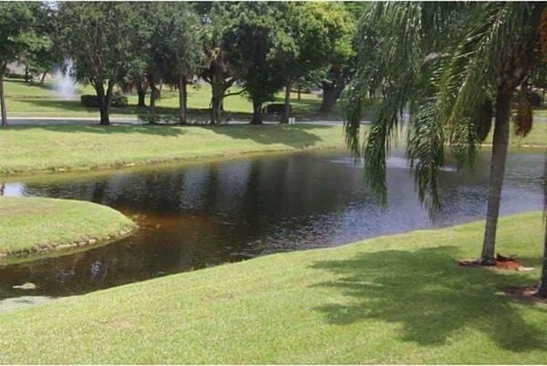 3350 Perimeter Dr Unit 1323, Greenacres, FL 33467 - view of home's community featuring a lawn and a water view