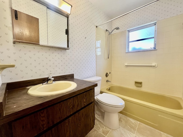 115 15th Ave, Vero Beach, FL 32962 - full bath with shower / washtub combination, wallpapered walls, vanity, and tile patterned floors