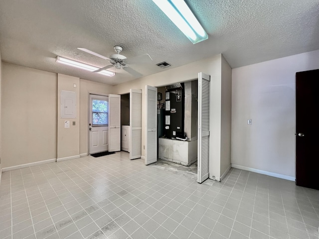 115 15th Ave, Vero Beach, FL 32962 - empty room with a textured ceiling and a ceiling fan
