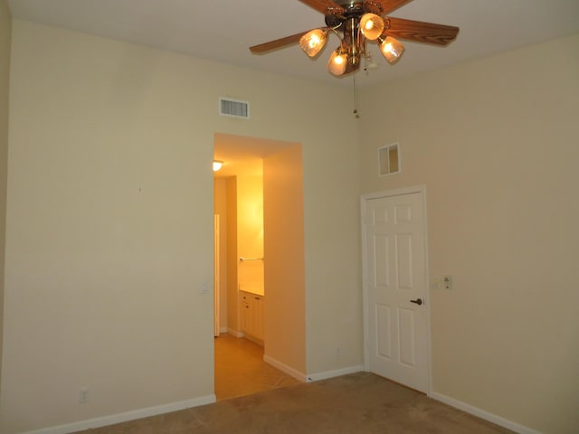 2357 Windjammer Way, West Palm Beach, FL 33411 - unfurnished bedroom with light colored carpet and ceiling fan